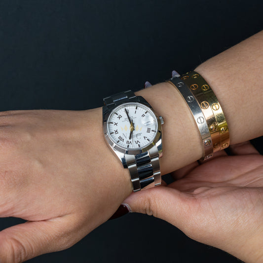 Rolex Oyster Perpetual Date, 34mm, Stainless Steel, Engine Turn Bezel, White Roman Dial, Ref.115210