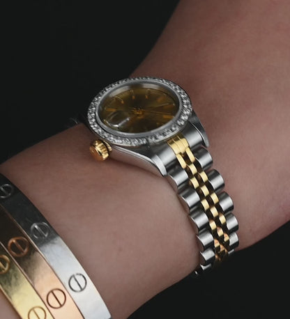 Rolex Datejust 26mm Ladies, Two Tone Yellow Gold & Steel, Champagne Dial, Aftermarket Diamond Bezel Ref. 179173